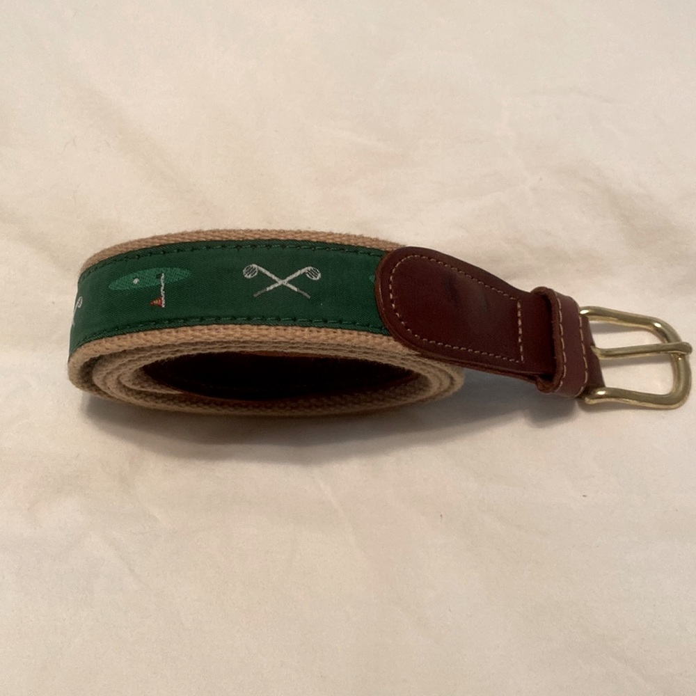 Preppy belt with golf accents.